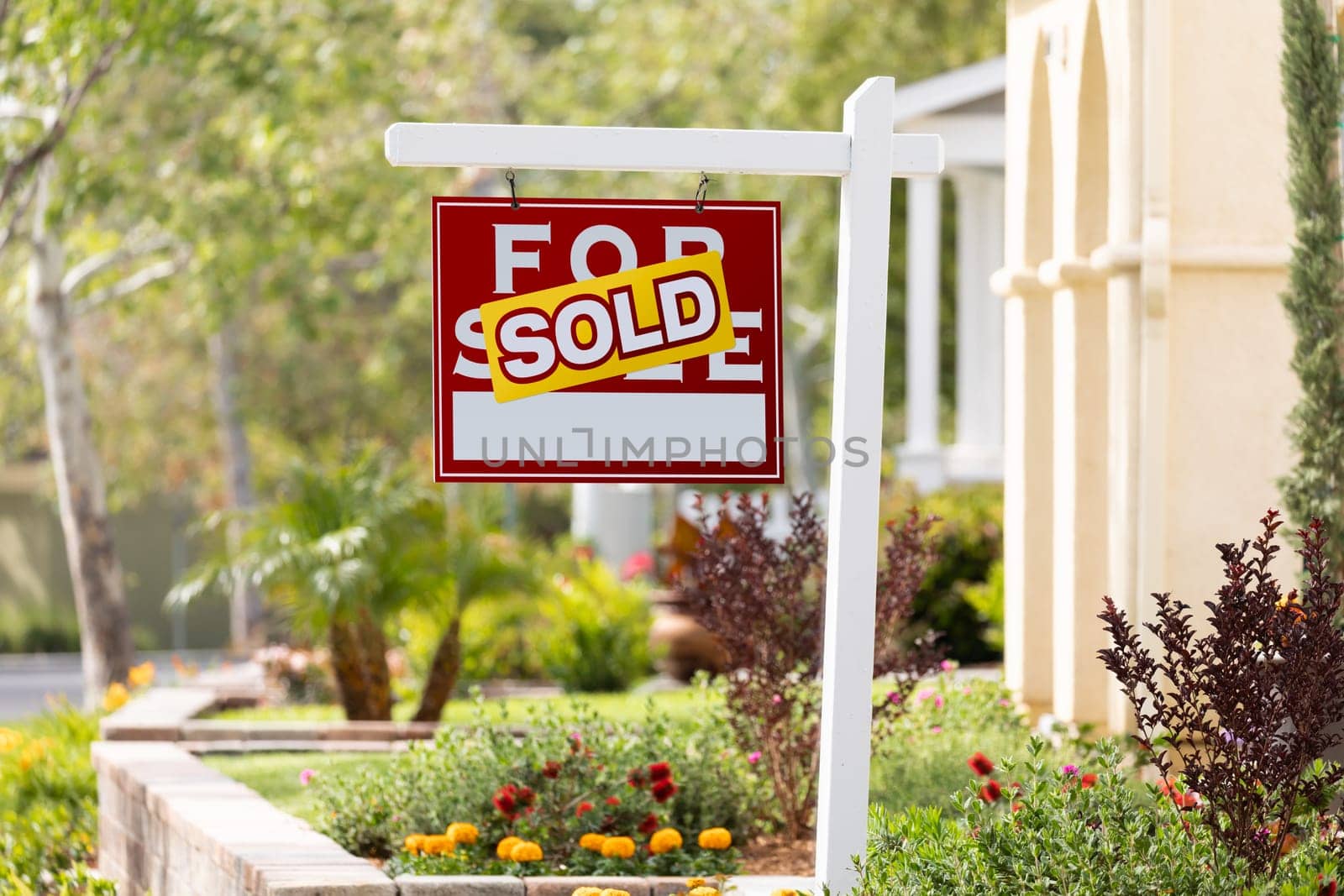 Sold Home For Sale Real Estate Sign in Front of New House.