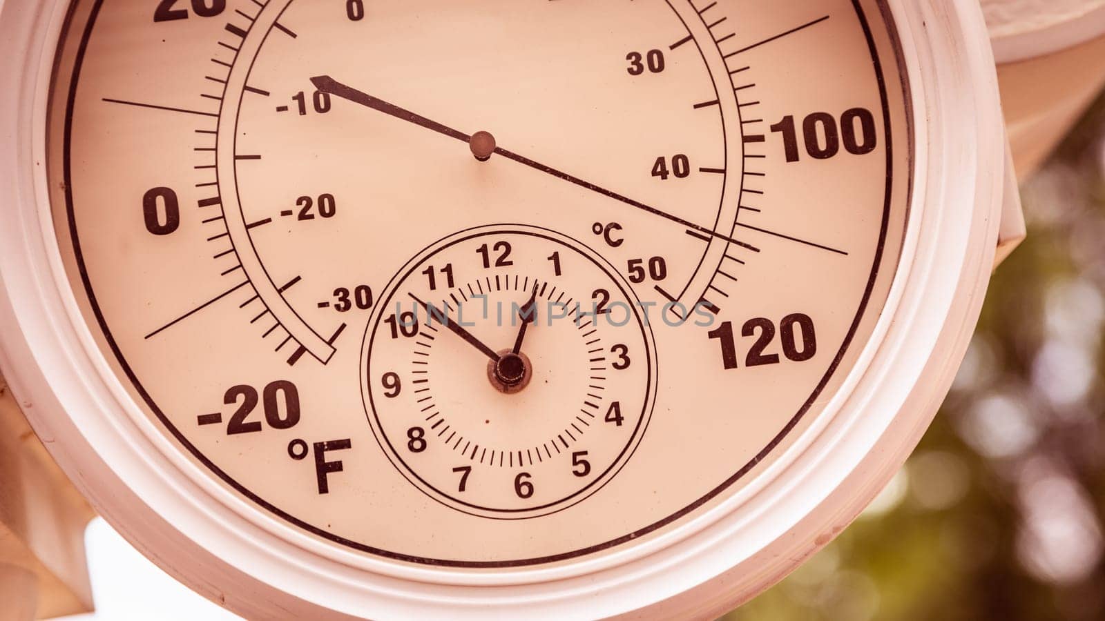 Round Thermometer Showing Over 110 Degrees