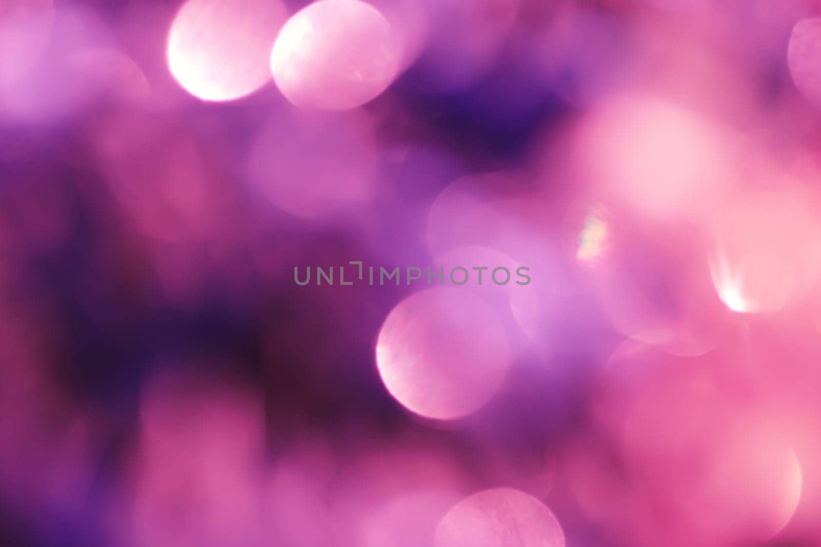 Abstract background with bokeh defocused lights and shadow.Multicolors bokeh.Vintage style.Disco purple lights.