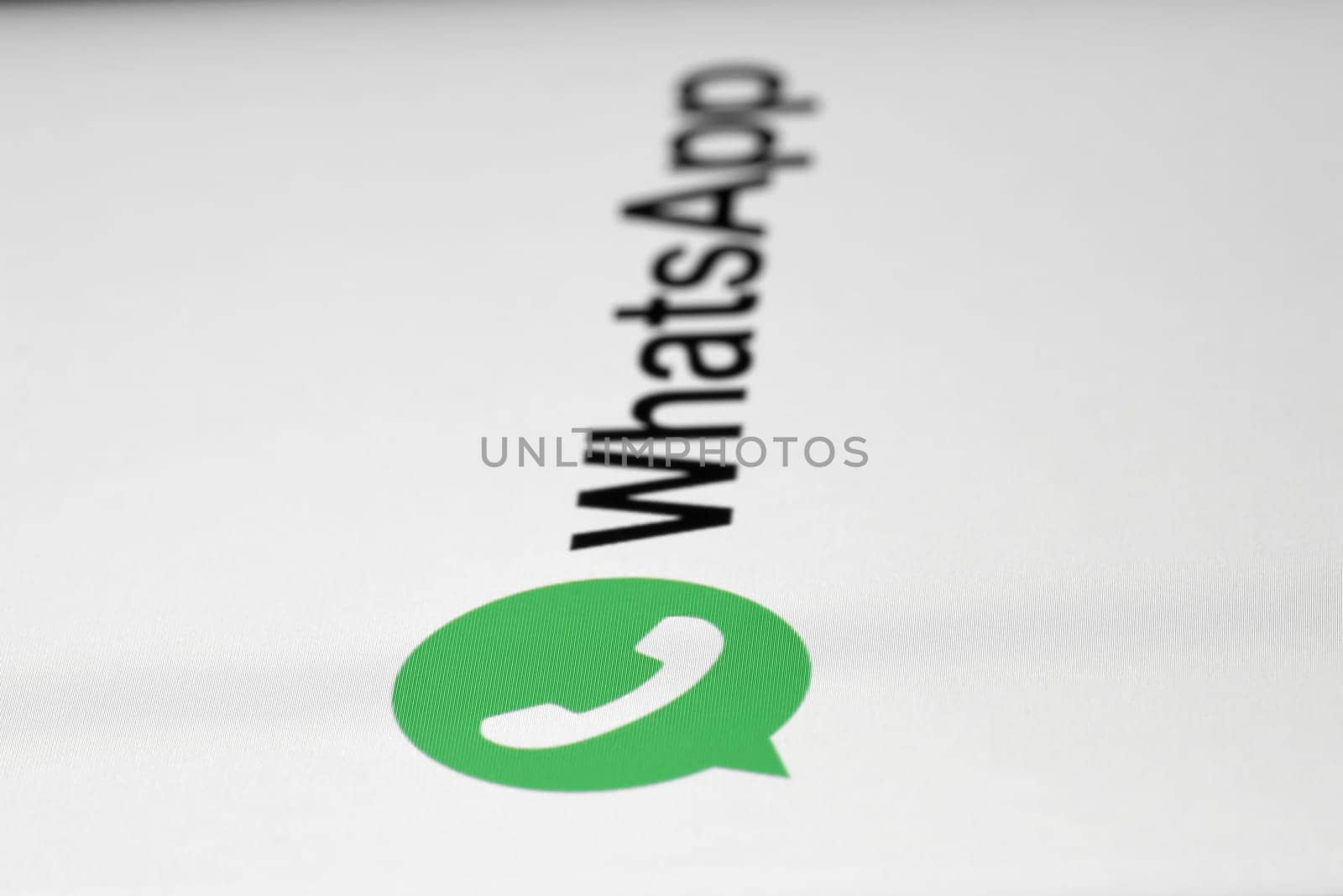 Whatsapp icon on the display of a smartphone