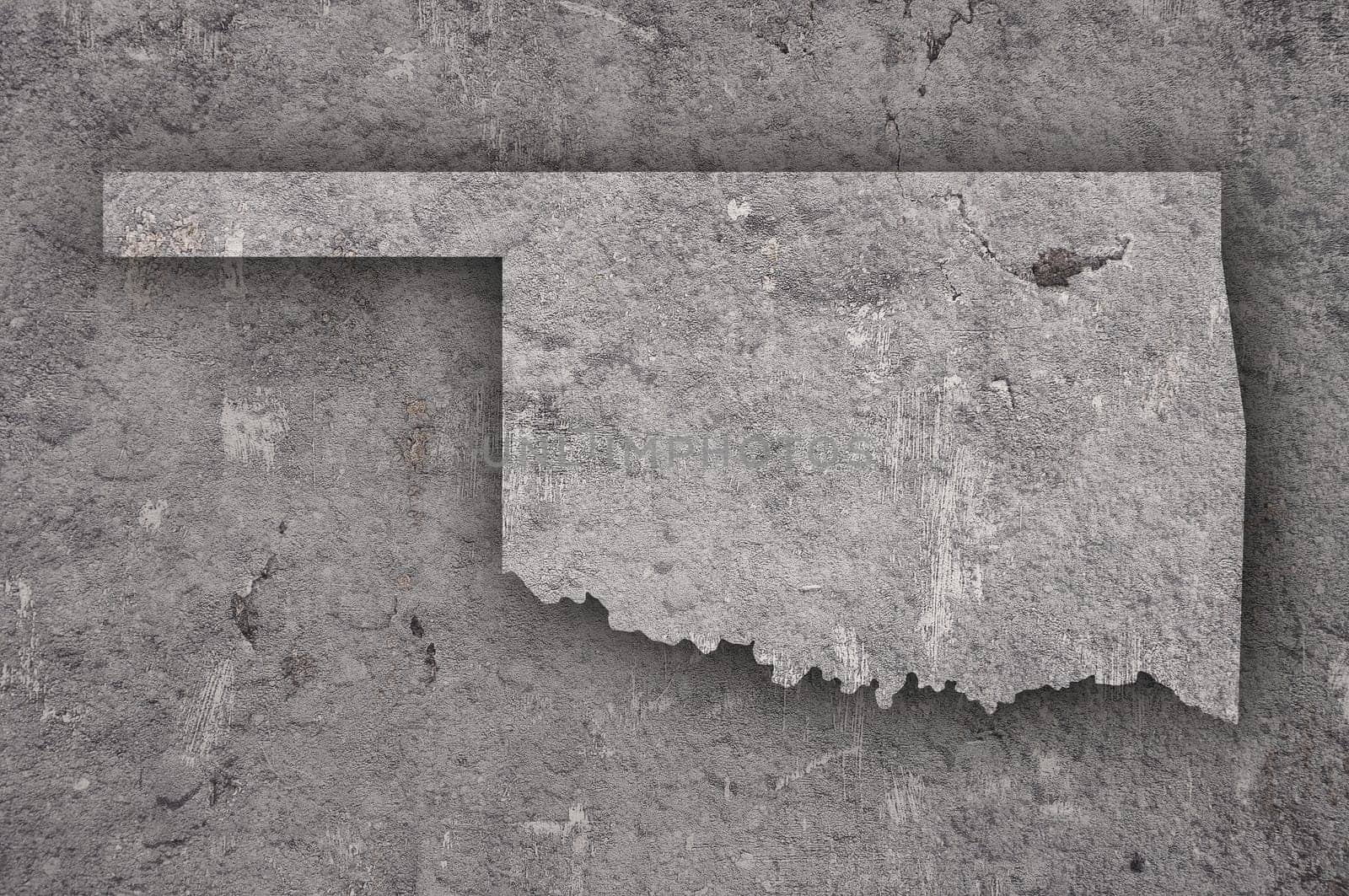 Map of Oklahoma on weathered concrete