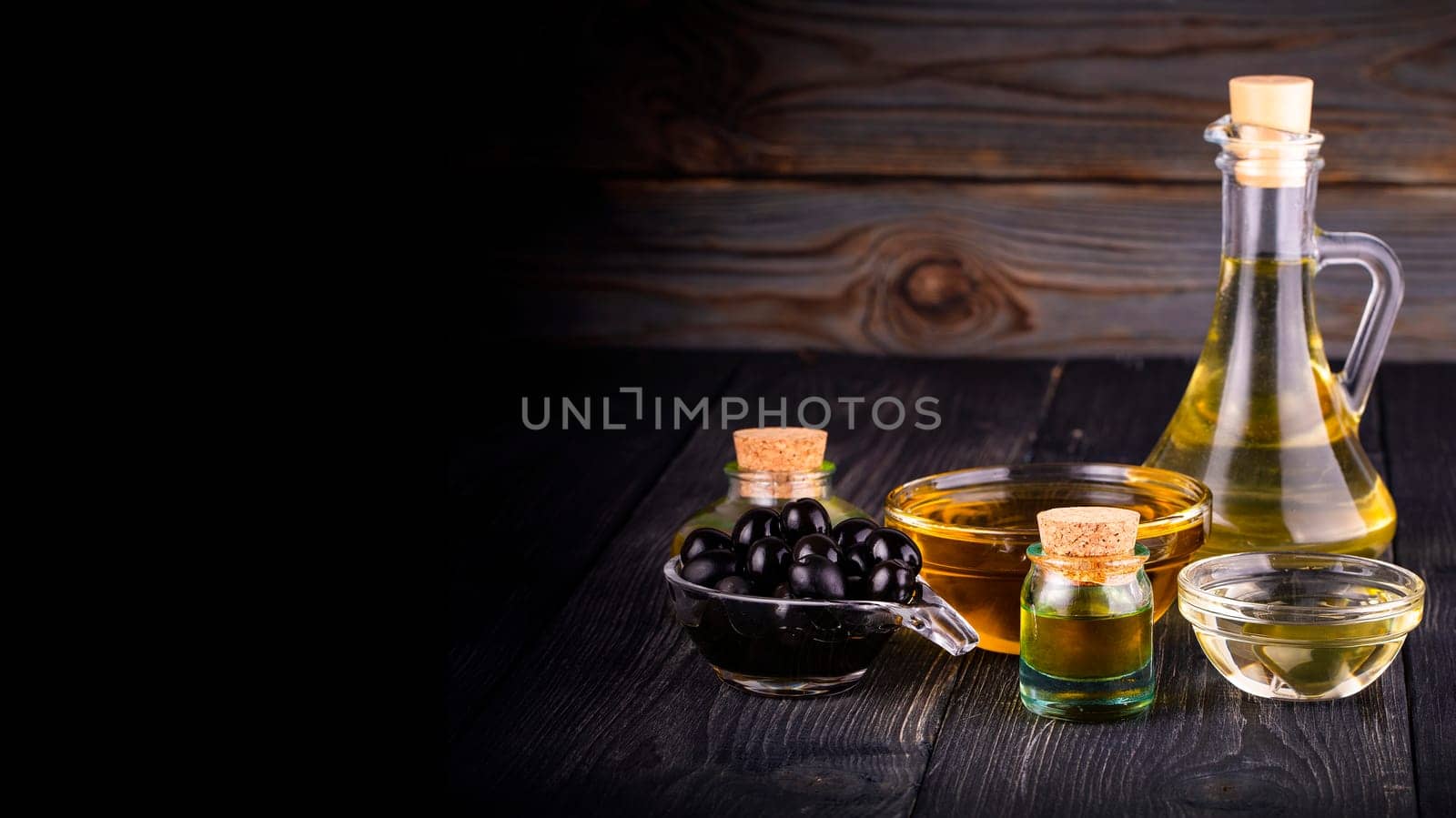 small bowl and bottle with olive oil