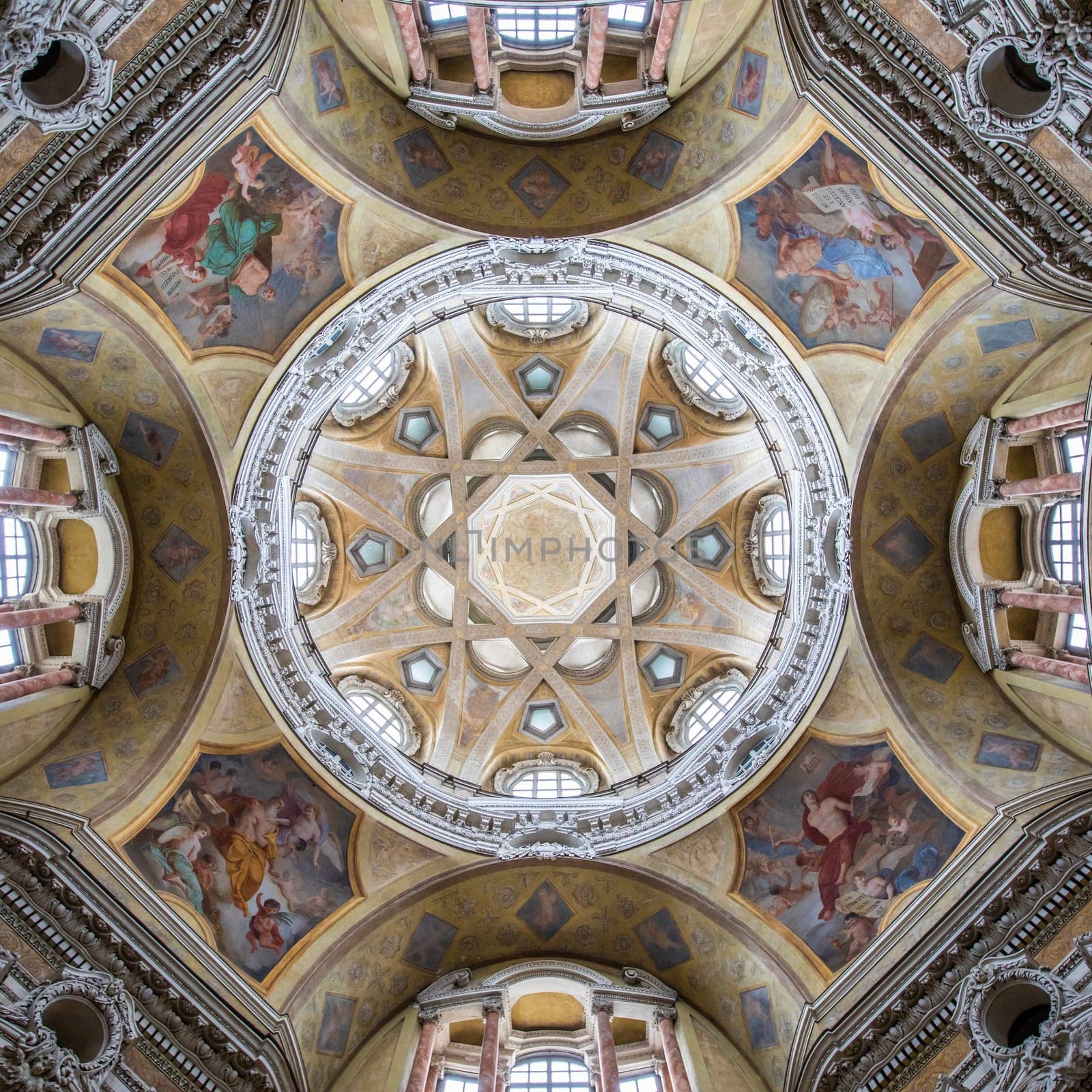 TURIN, ITALY - CIRCA MAY 2021: Antique baroque interior with vintage decoration. Royal Church of San Lorenzo (St. Lawrence).