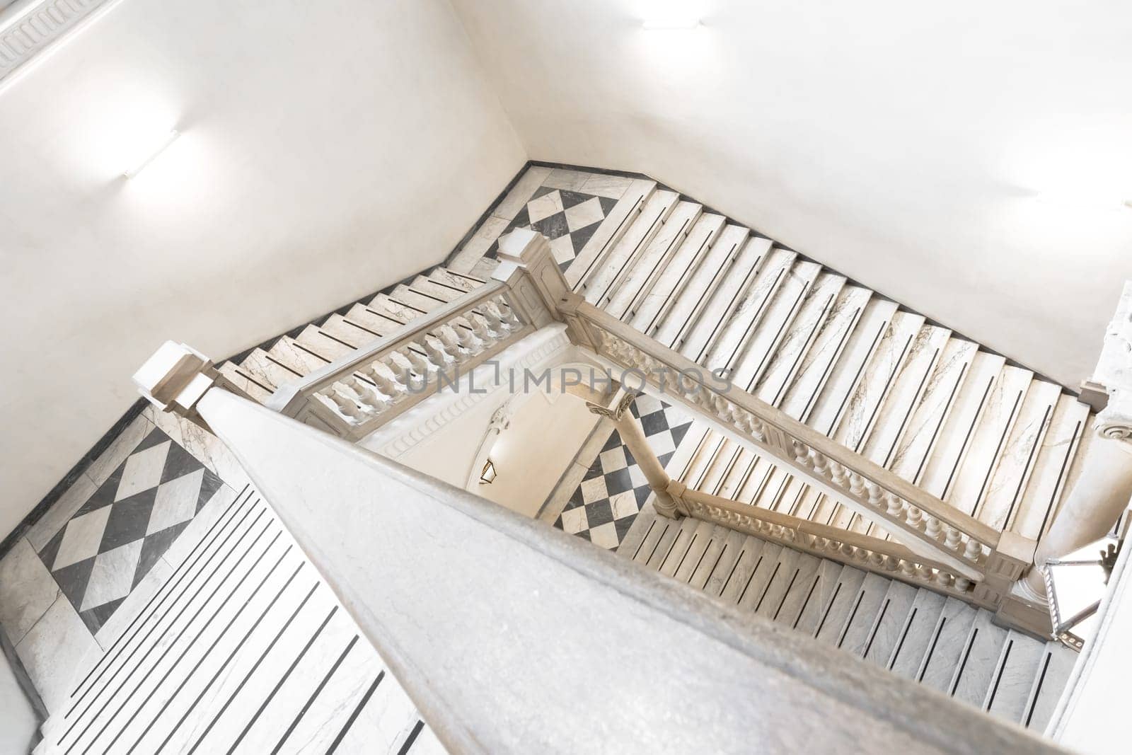 TURIN, ITALY - CIRCA MAY 2021: luxury staircase made of marble in an antique Italian palace