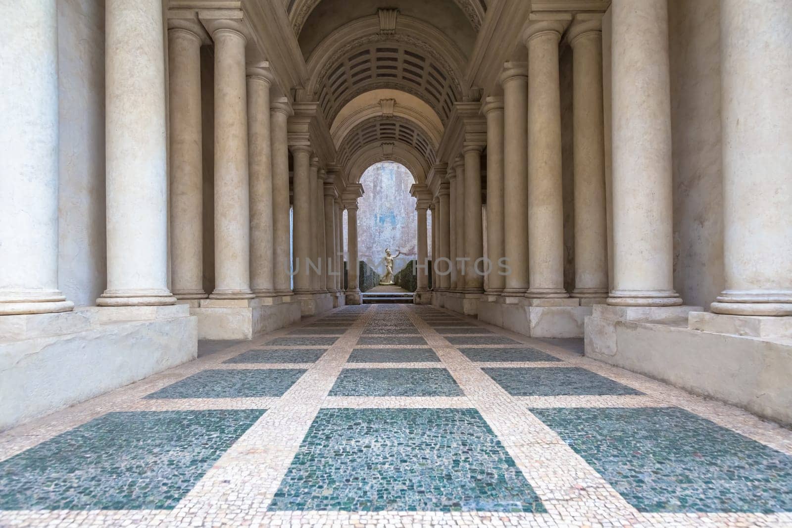 ROME, ITALY - August 23, 2018: Prospettiva Borromini (Borromini Perspective), corridor with marble columns in this luxury palace