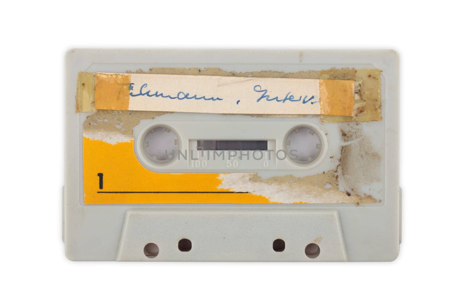 Labeled used audio tape isolated over white Background