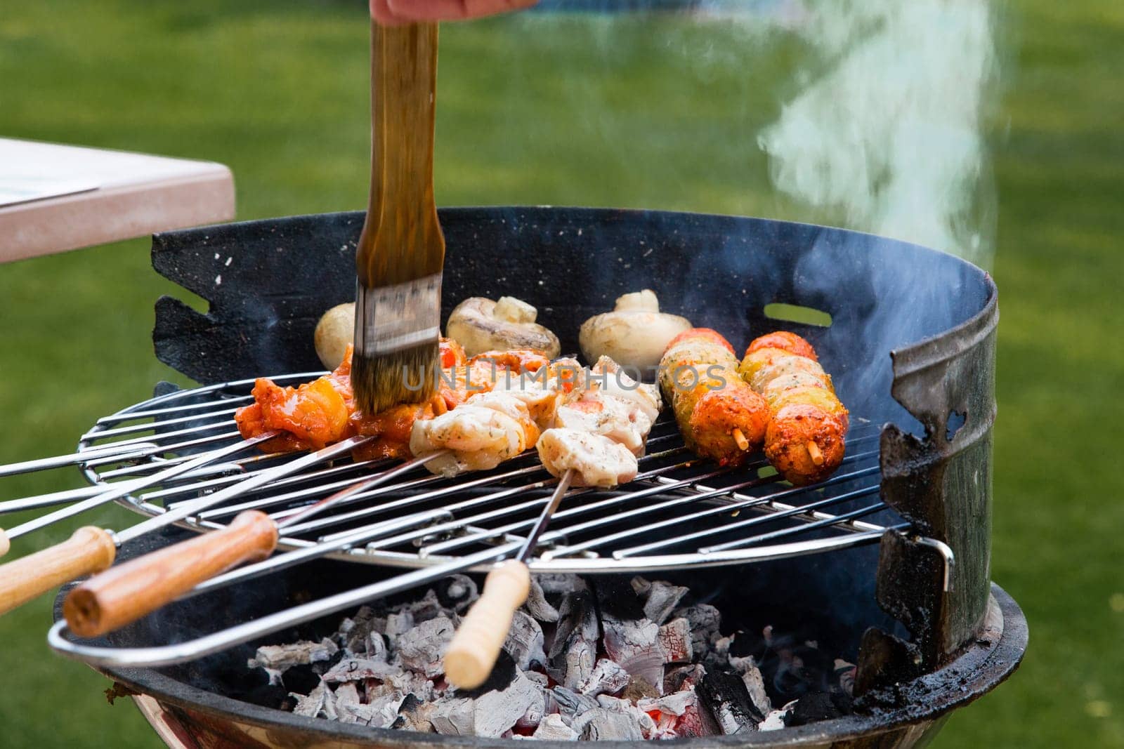 Grilled meat on a summer barbecue in the garden