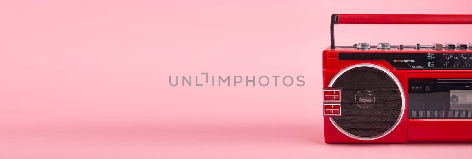 Panorama from ted vintage Tape player isolated on pinkbackground