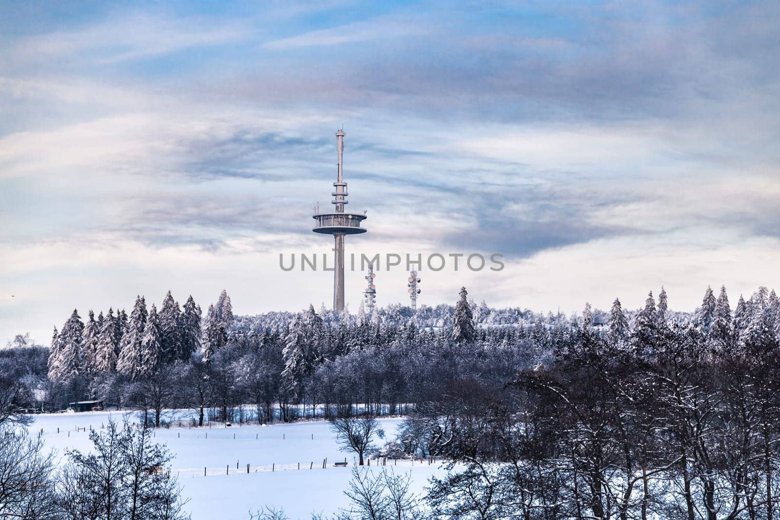 Beautiful landscape with view to Hoherodskopf and snow in Hesse Germany