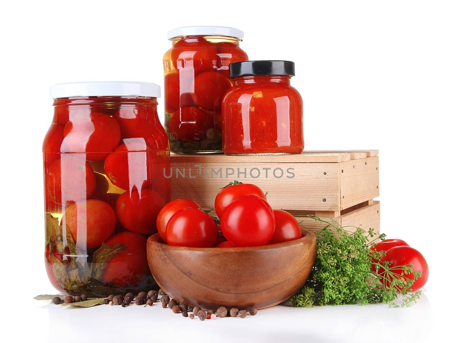 Tasty canned and fresh tomatoes, isolated on white