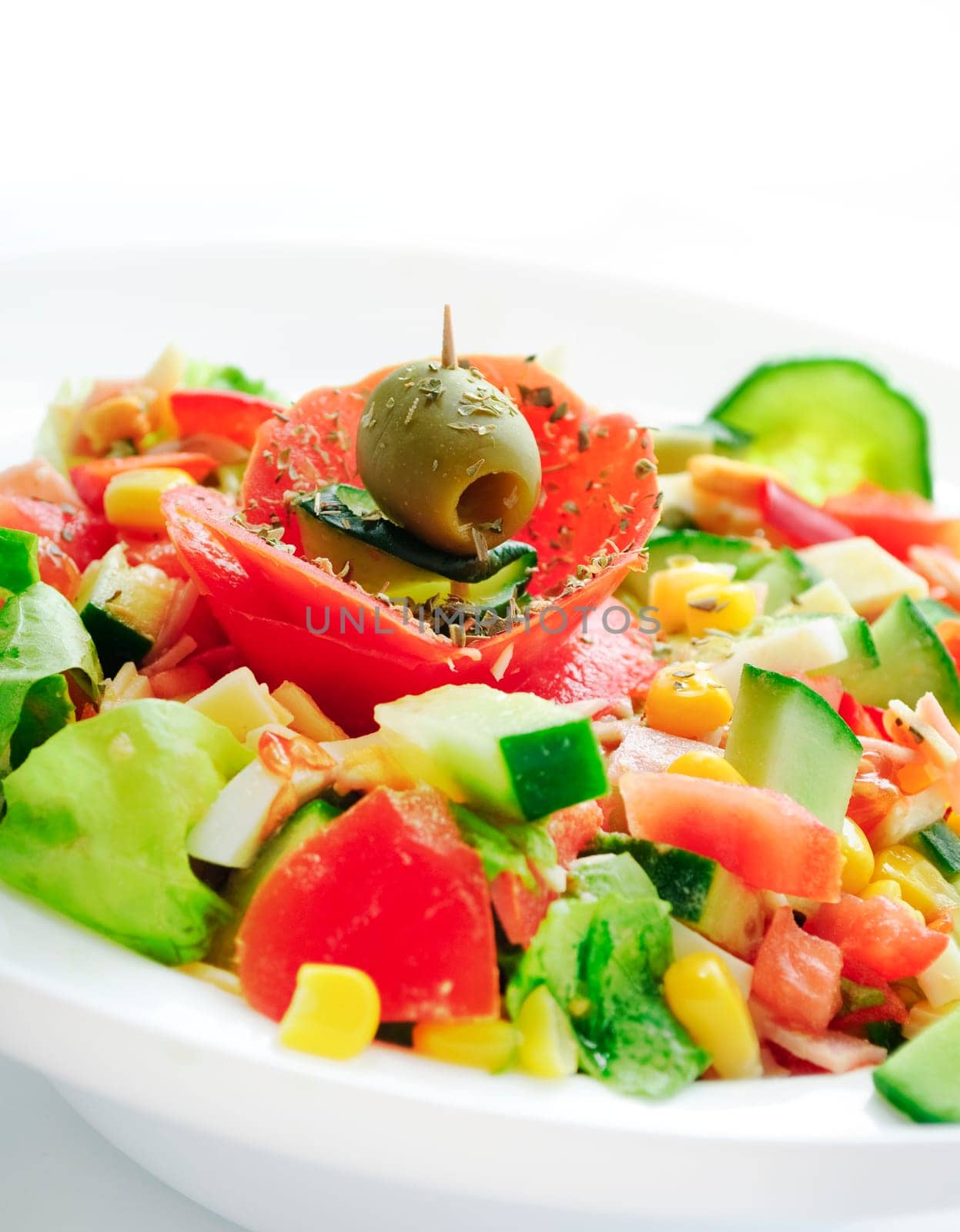 Decorative colorful salad with various vegetables