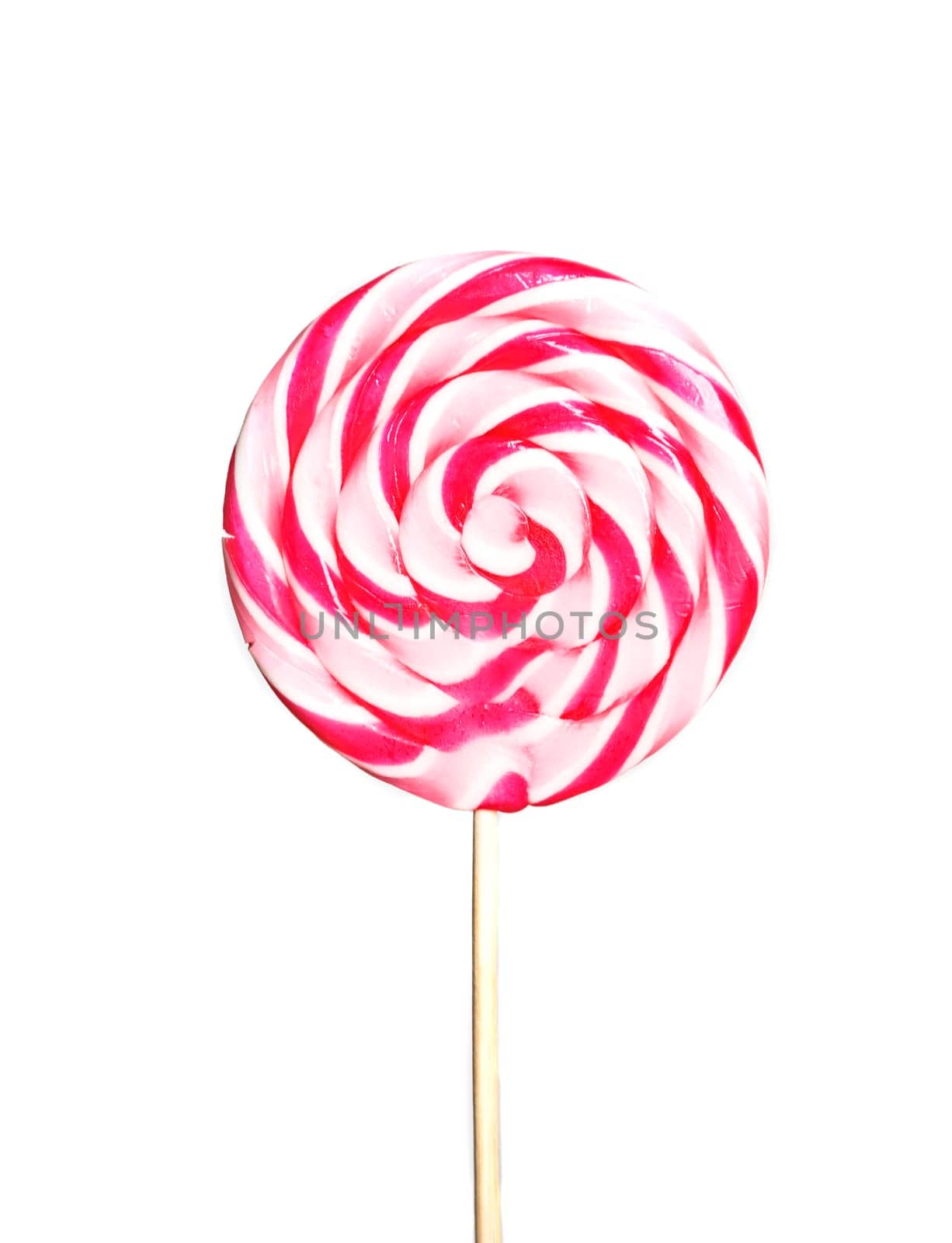 Pink lollipop isolated over white