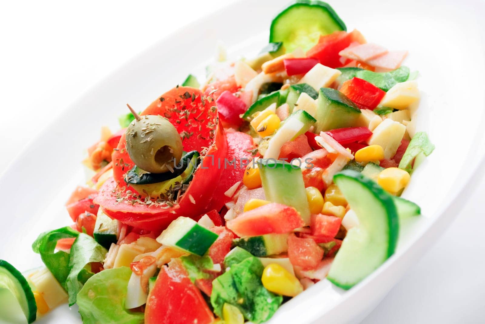 Decorative colorful salad with various vegetables