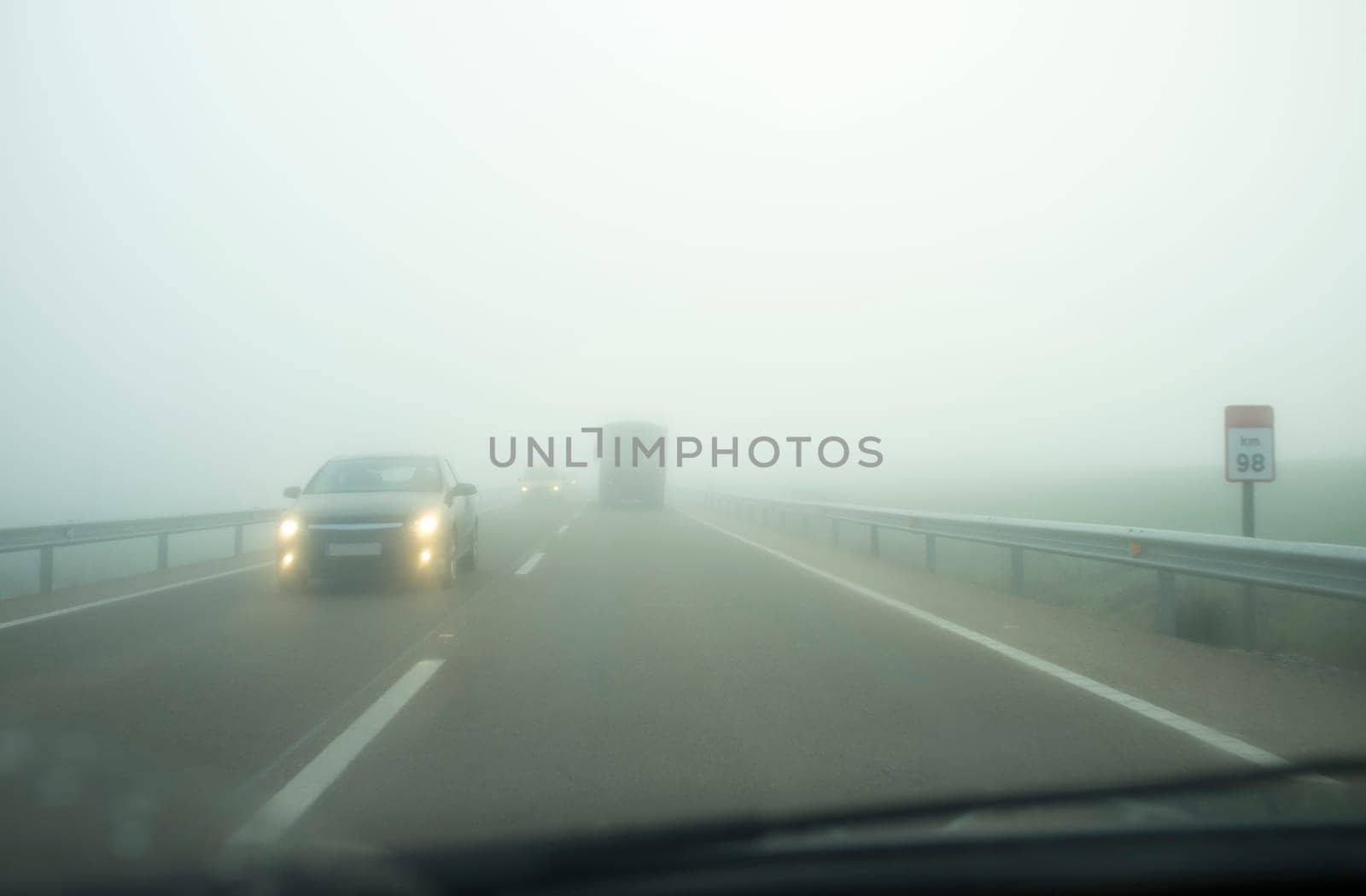 Driving under dense fog. Extreme bad-weather conditions
