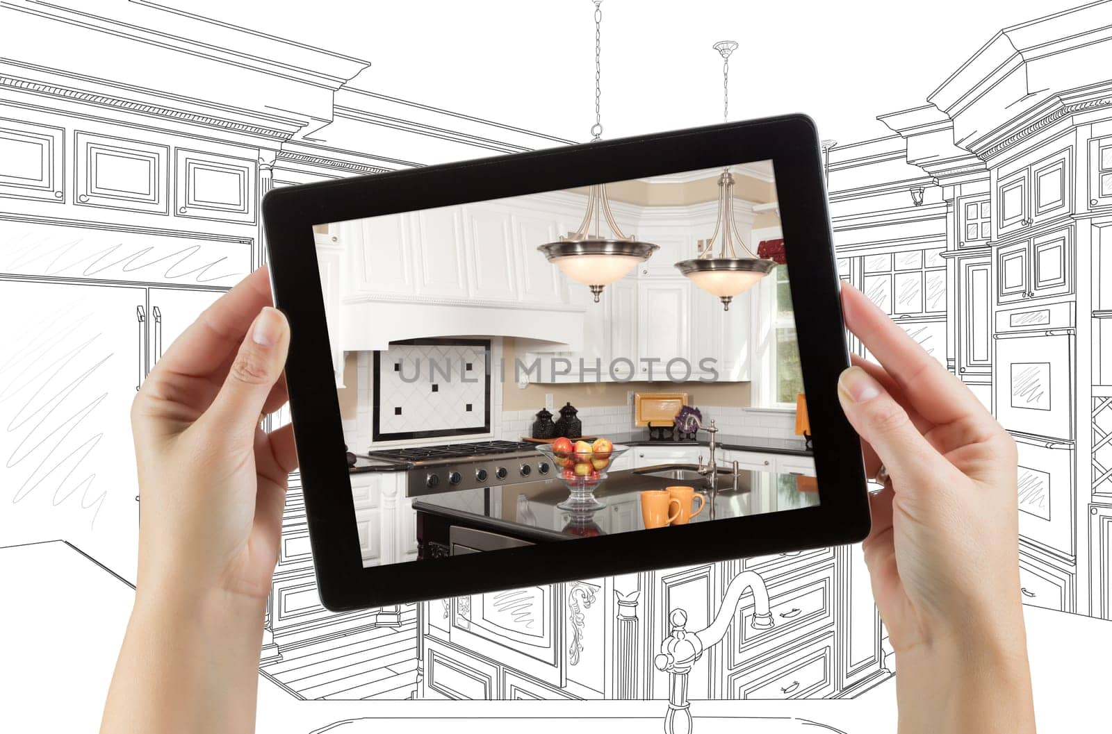 Female Hands Holding Computer Tablet with Kitchen on Screen & Drawing Behind.