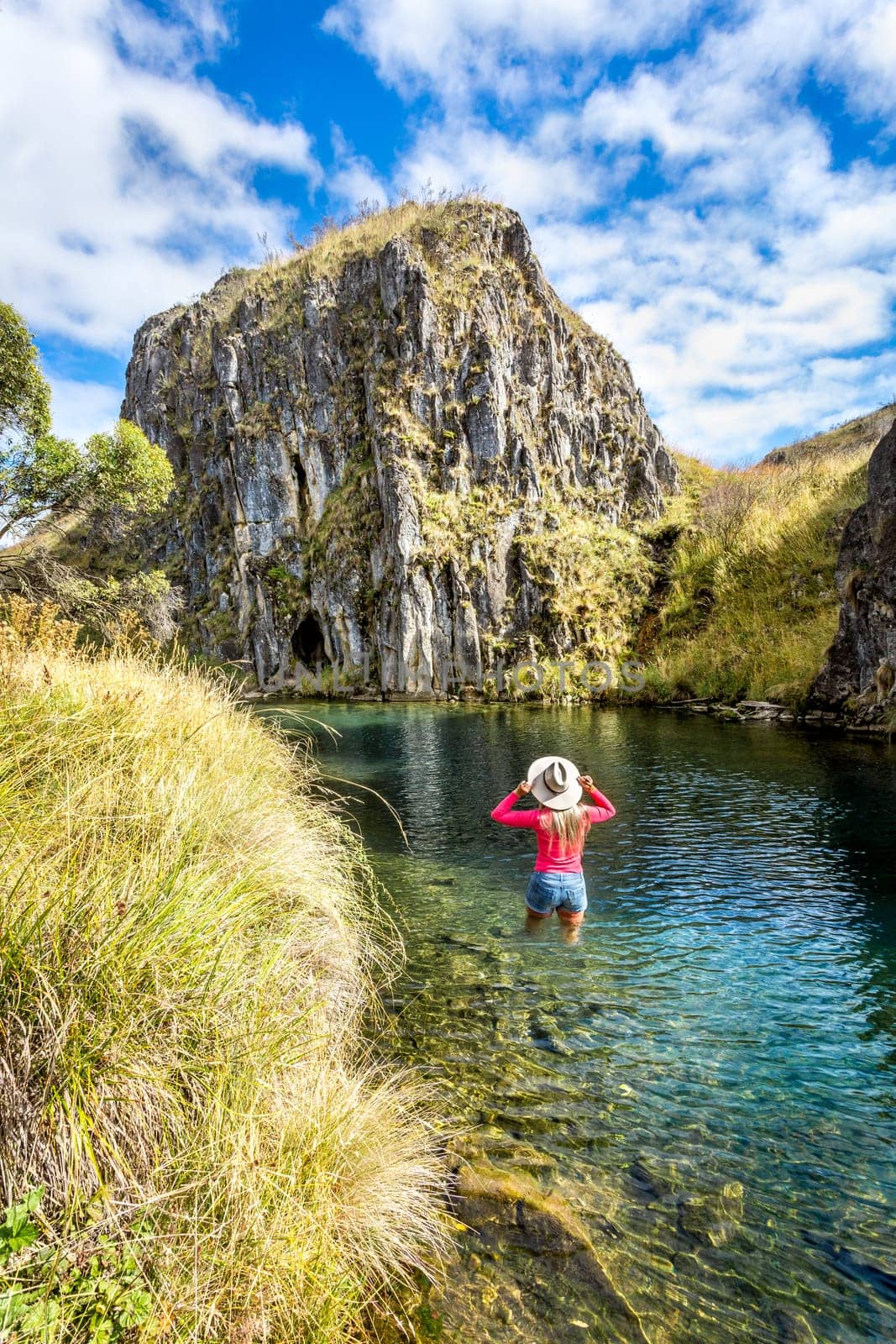 Woman tourist or visitor  walking through Clarkes Gorge in NSW Australia