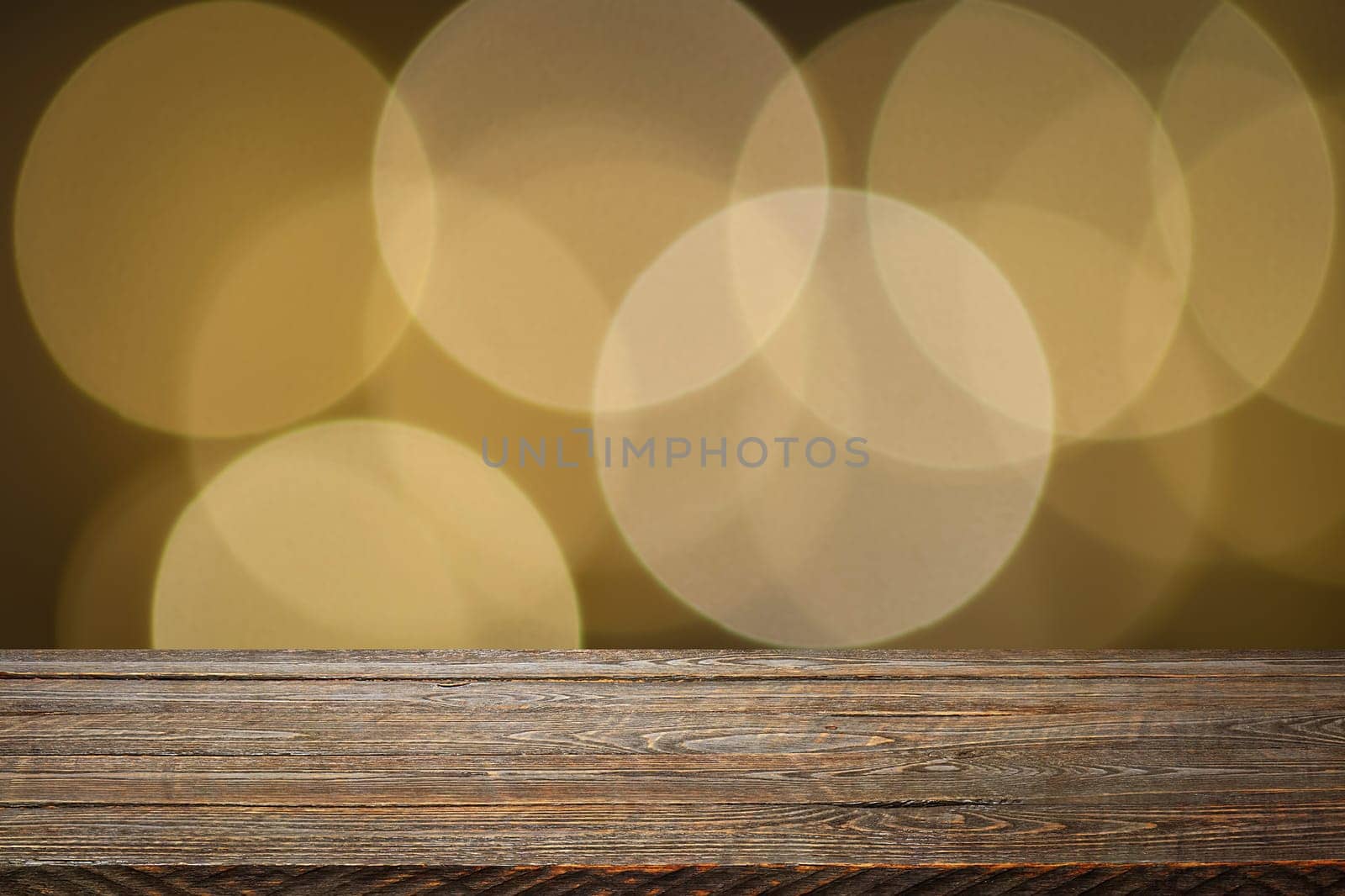 The background is an empty wooden board and a wall of blurred bokeh lights. For product demonstrations, free space, layout, mockup, perspective board, background board.