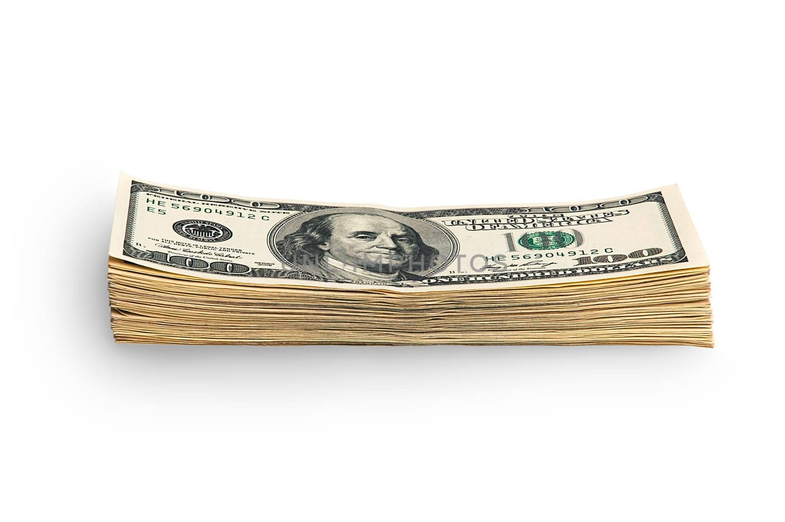 A stack of packaged dollars on a white background. One hundred American dollar bills. The pile of dollars is isolated with a shadow. A big wad of dollars. Place for logo, lettering, layout, layout.