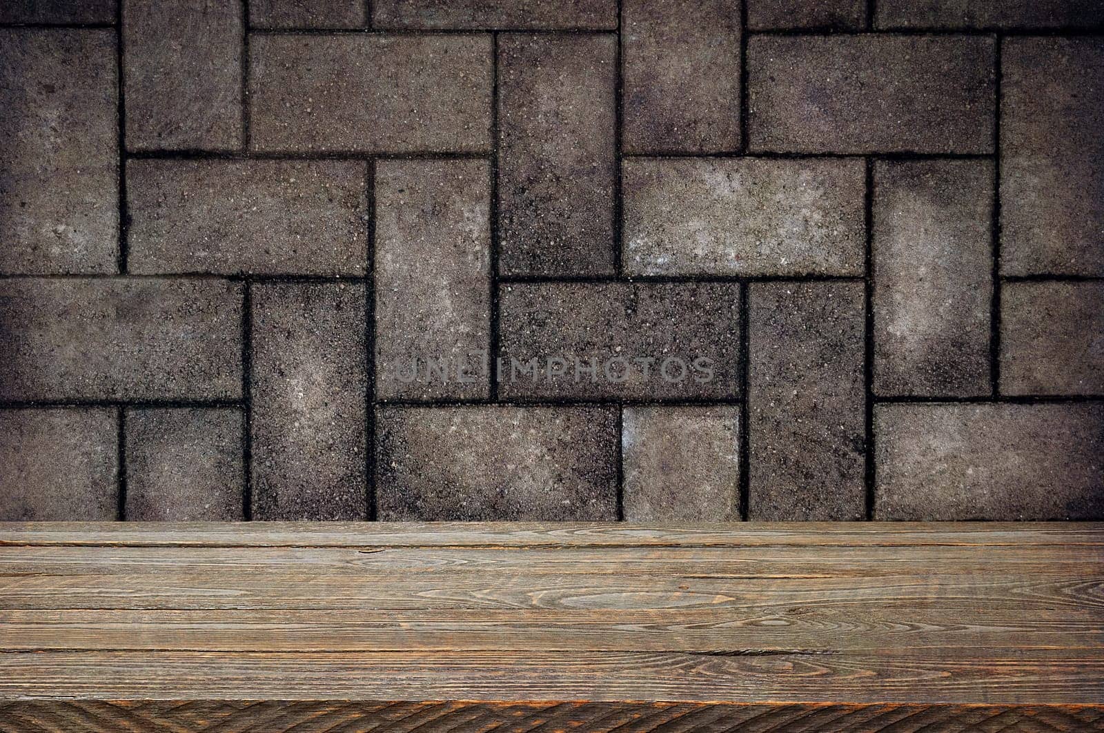 The background is blank wooden boards and a textured brick wall with lighting and vignetting. For product demonstrations, free space, layout, mockup, perspective board, background board.