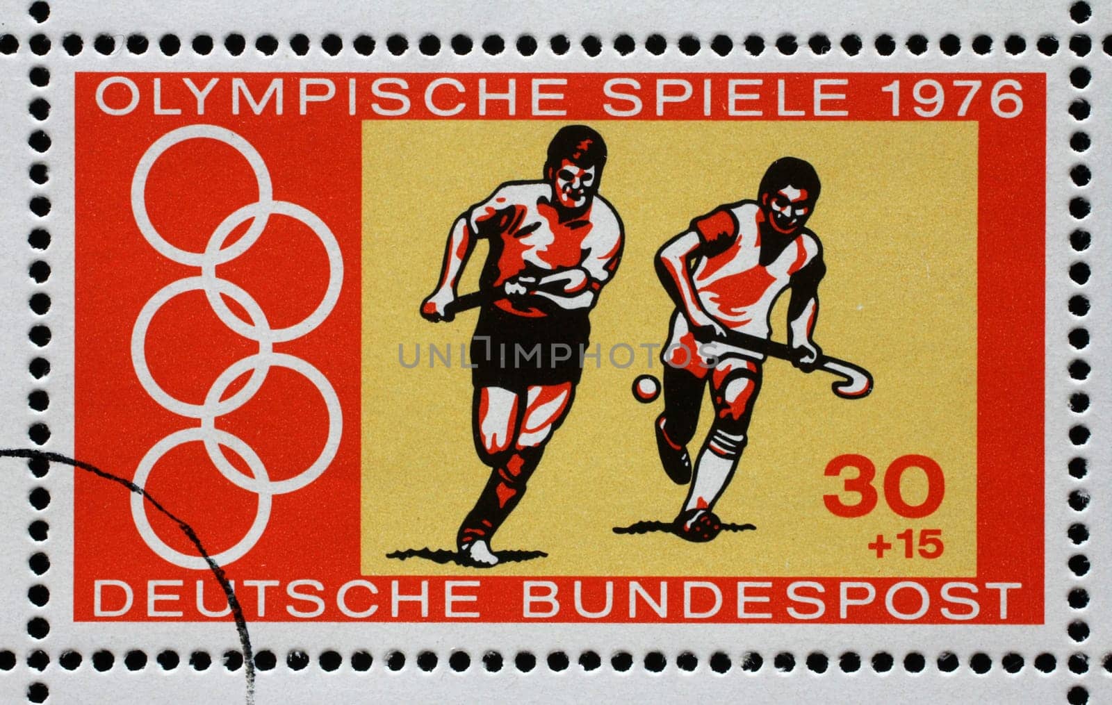 A stamp printed in Germany shows Hockey, Summer Olympic Games 1976 in Montreal, circa 1976