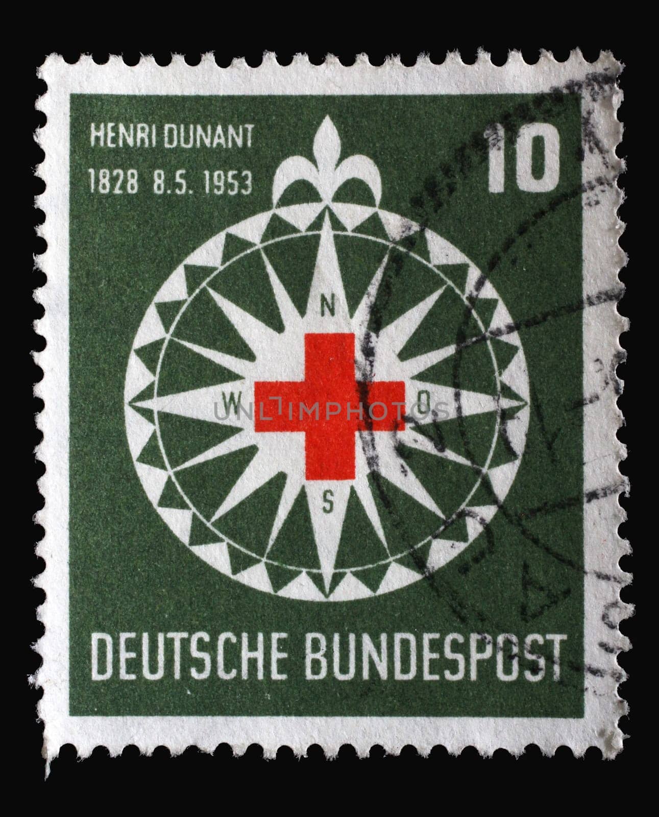 Stamp printed in Germany, shows symbol of the Red Cross in a stylized wind rose, circa 1953