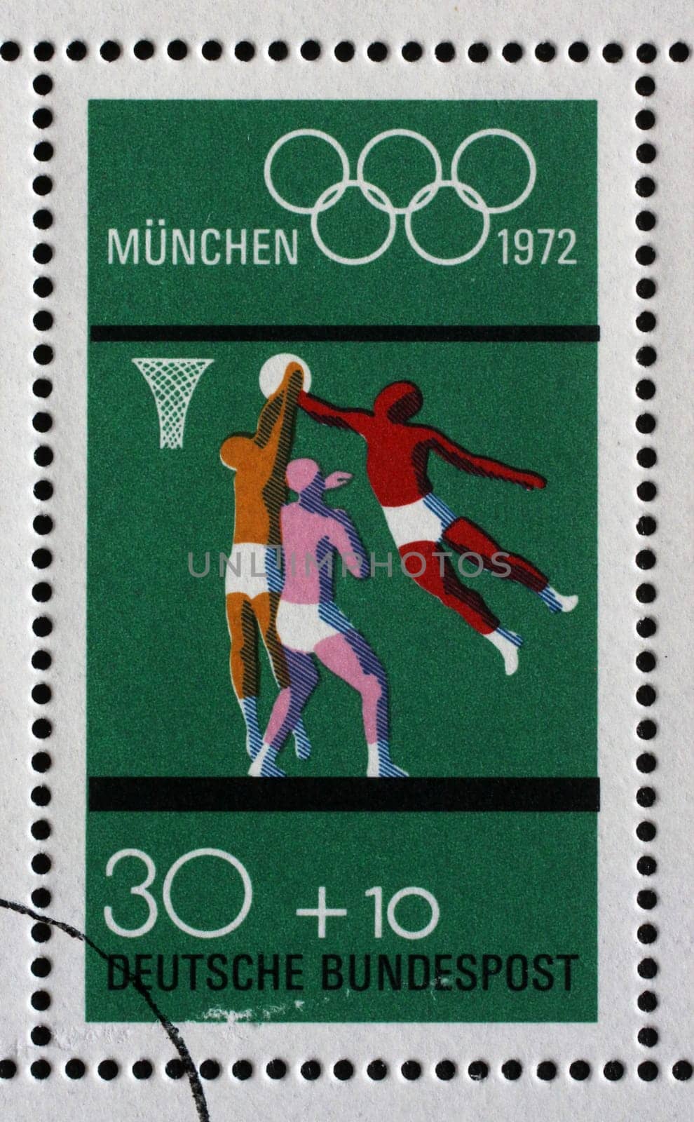 Stamp printed in Germany shows Basketball and Olympic Rings, Summer Olympic Games 1972 in Munich, circa 1972