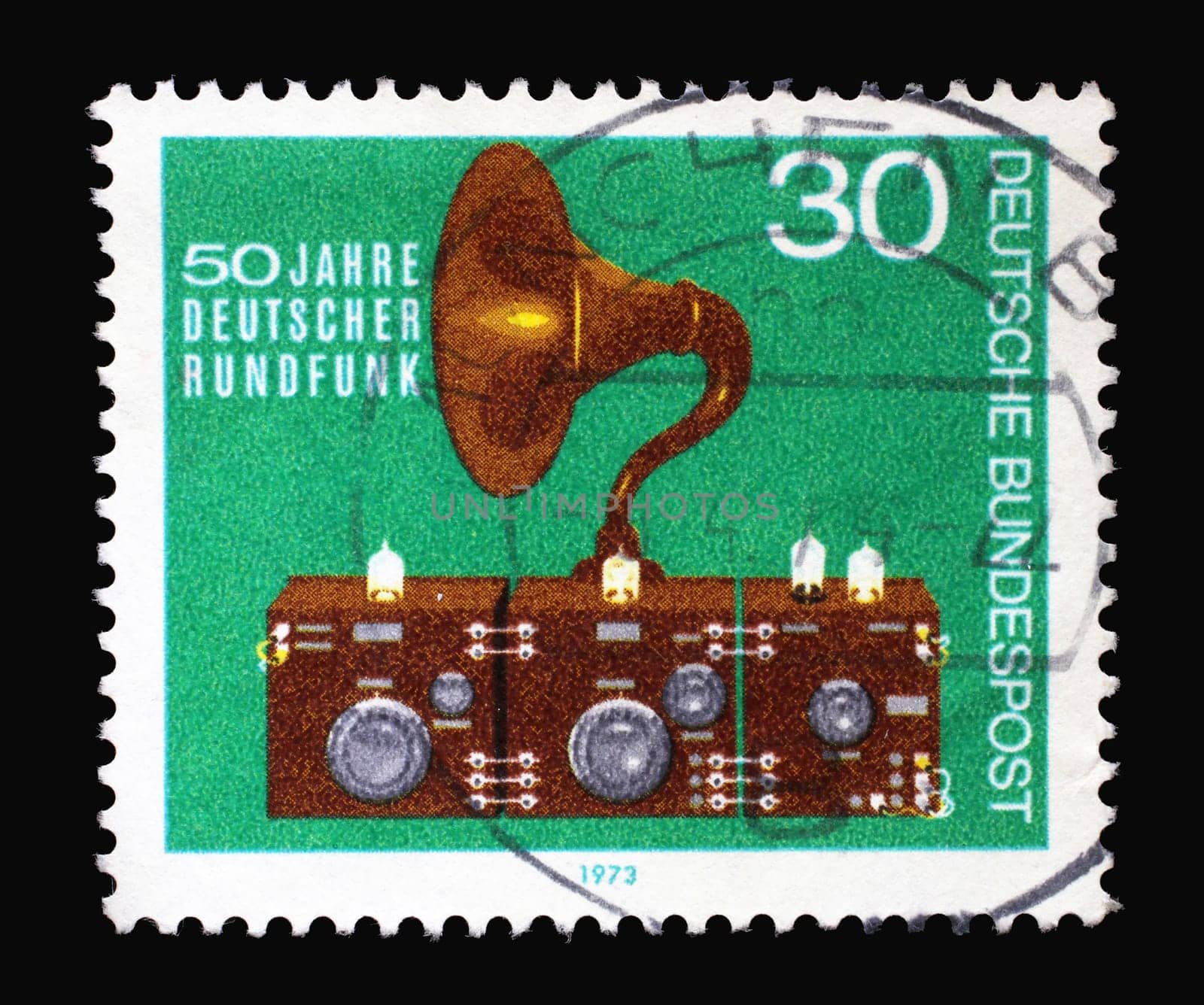 A stamp printed in Germany showing an old radio, 50th Anniversary of German Broadcasting, circa 1973