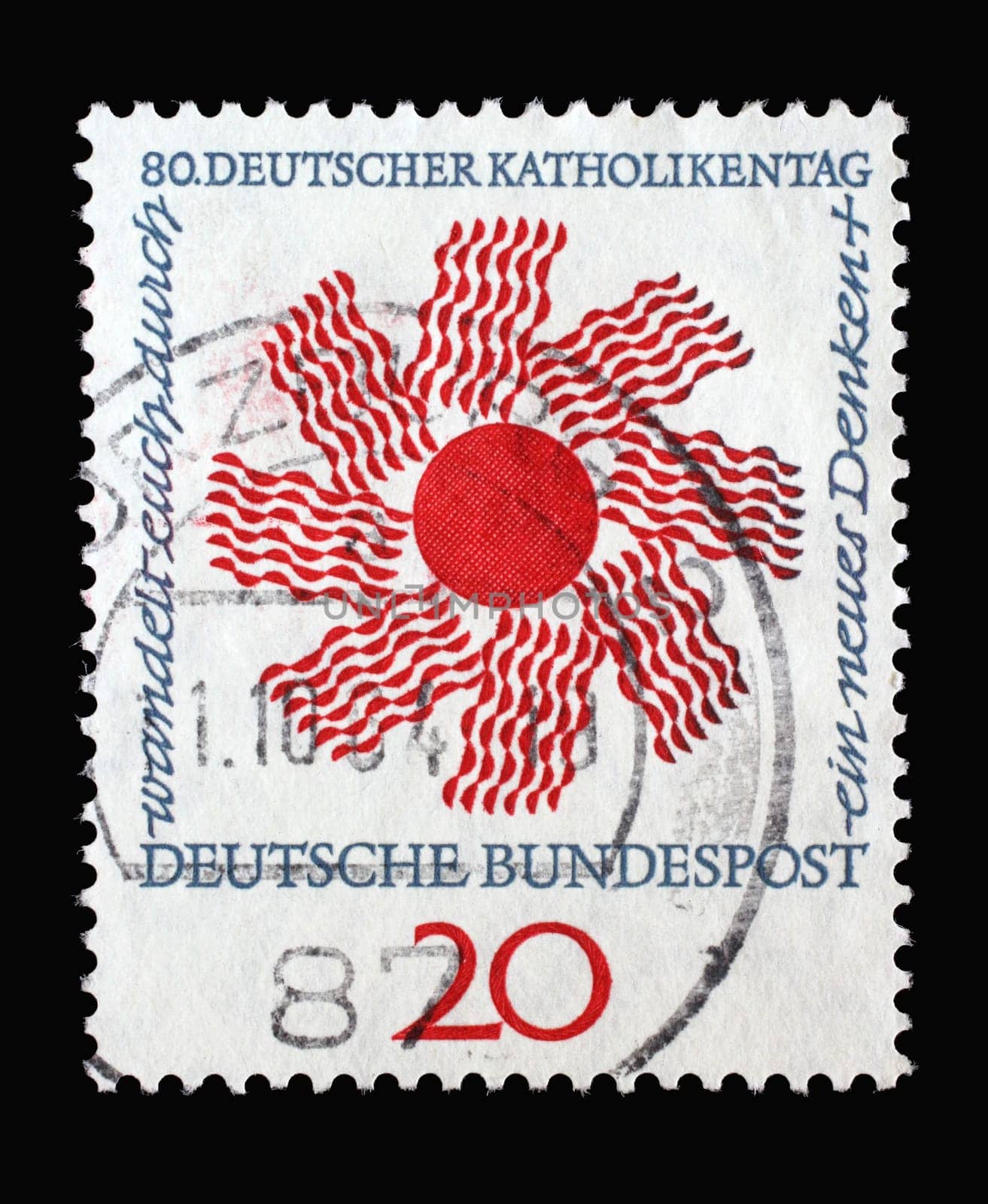 Stamp printed in Germany showing a stylized sun with inscription: walk through a new way of thinking. German Catholic Day in Stuttgart, circa 1964