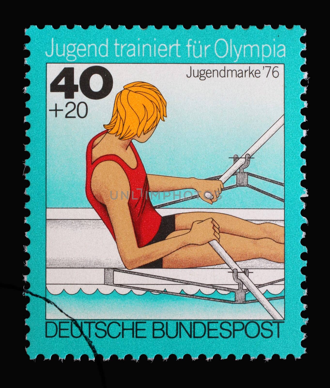 A stamp printed in Germany shows Rowing, single sculls, Youth training for the Olympics, circa 1976