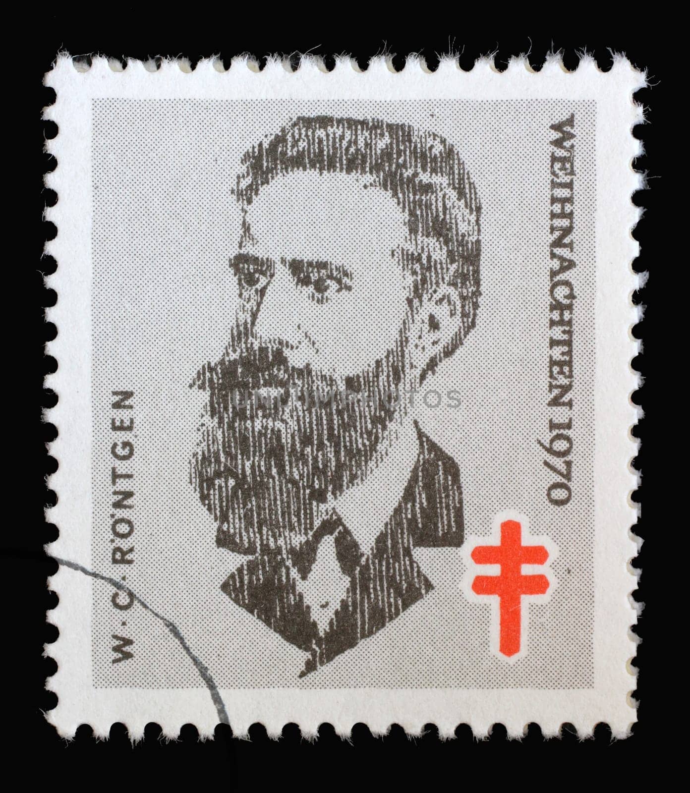 Stamp printed in Germany shows portrait of Wilhelm Conrad Röntgen, Christmas 1970, circa 1970