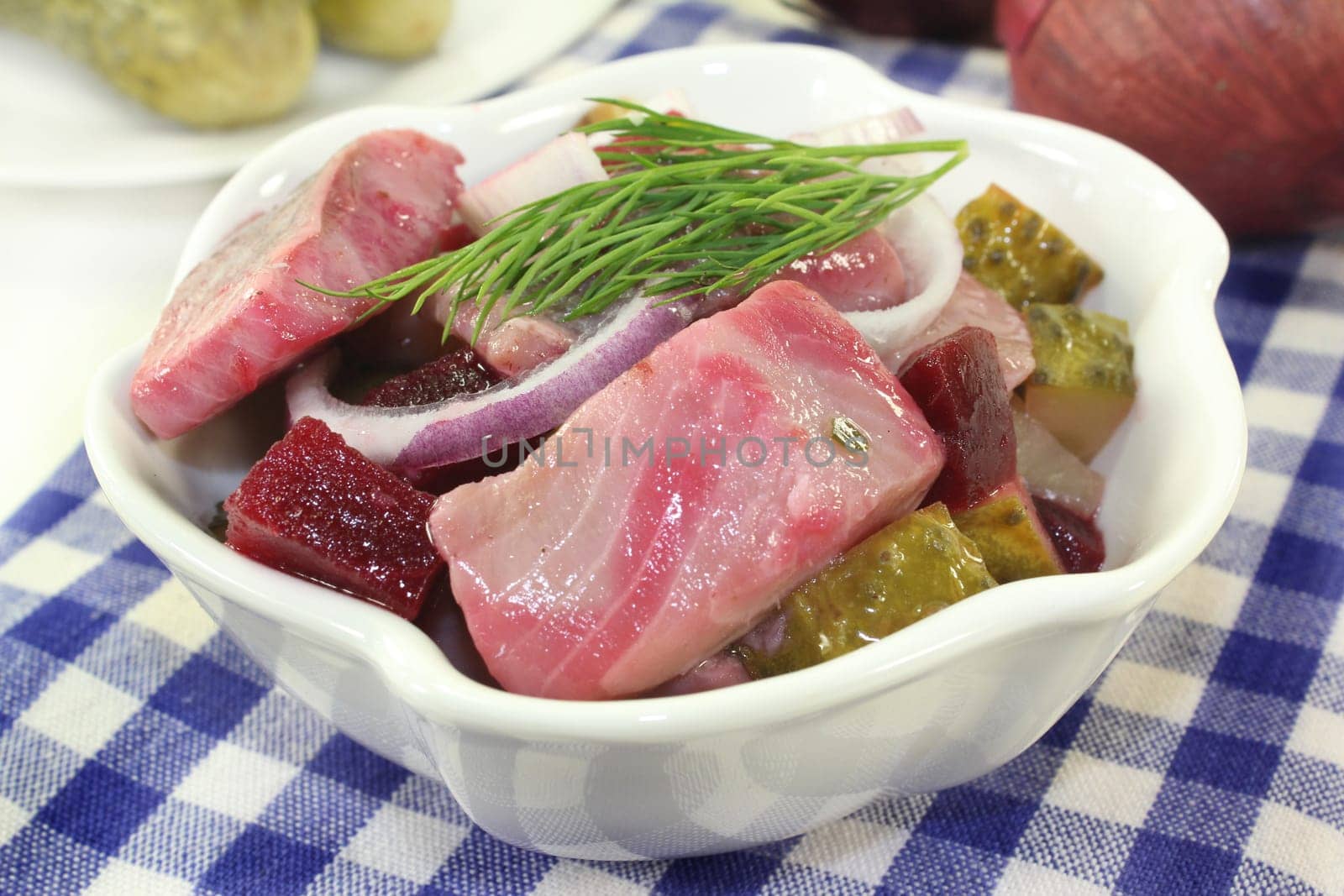 Matjessalat with beetroot,onions and sour cucumber