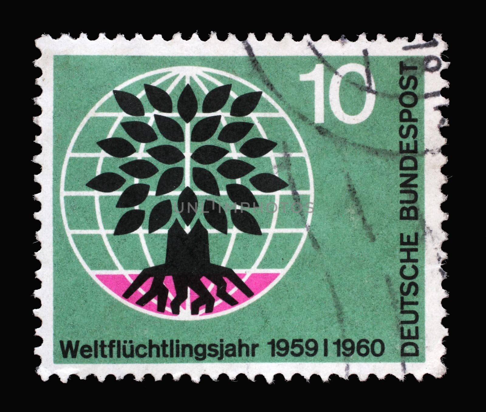 Stamp printed in Germany showing a stylized tree in a globe. World Refugee Year, circa 1960