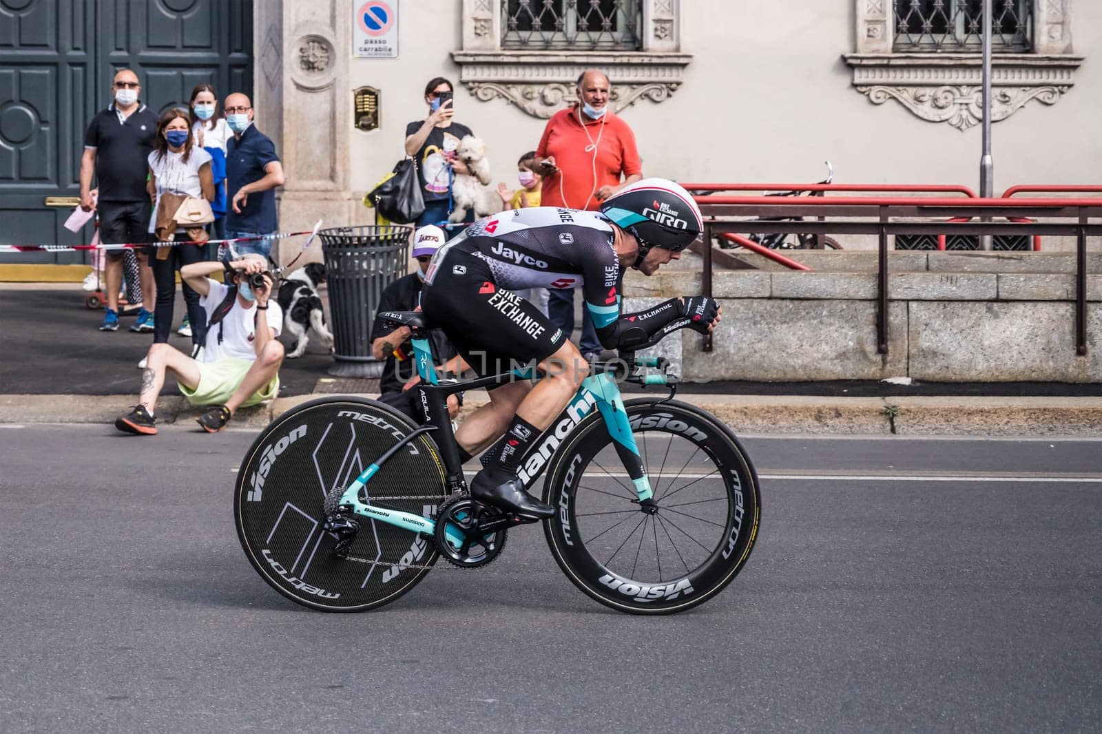 MILAN, ITALY - MAY 30: last stage of Giro 2021, Simon Yates competitor of BikeexchangeTeam  at high speed in front of viewers during individual time trial in city streets, shot on may 30, 2021 Milan, Italy.