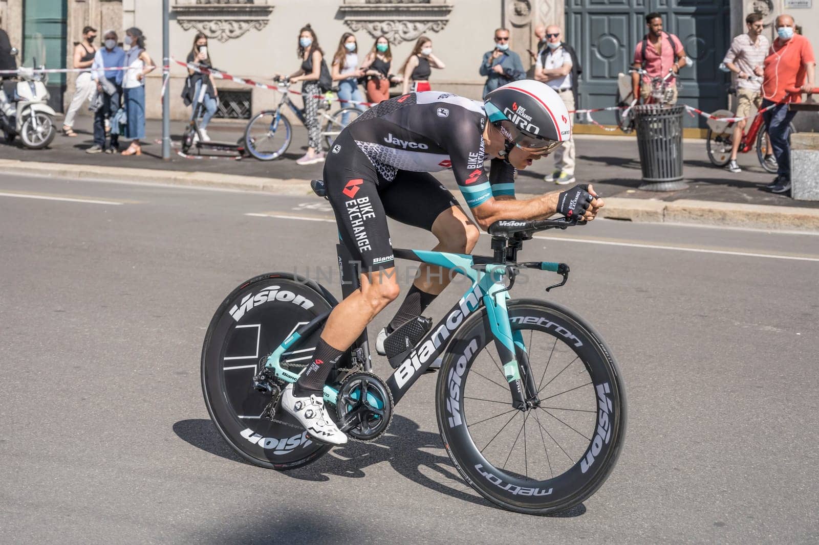 MILAN, ITALY - MAY 30: last stage of Giro 2021, Tanel Kangert competitor of BikeExchange Team at high speed during individual time trial in city streets, shot on may 30, 2021 Milan, Italy.