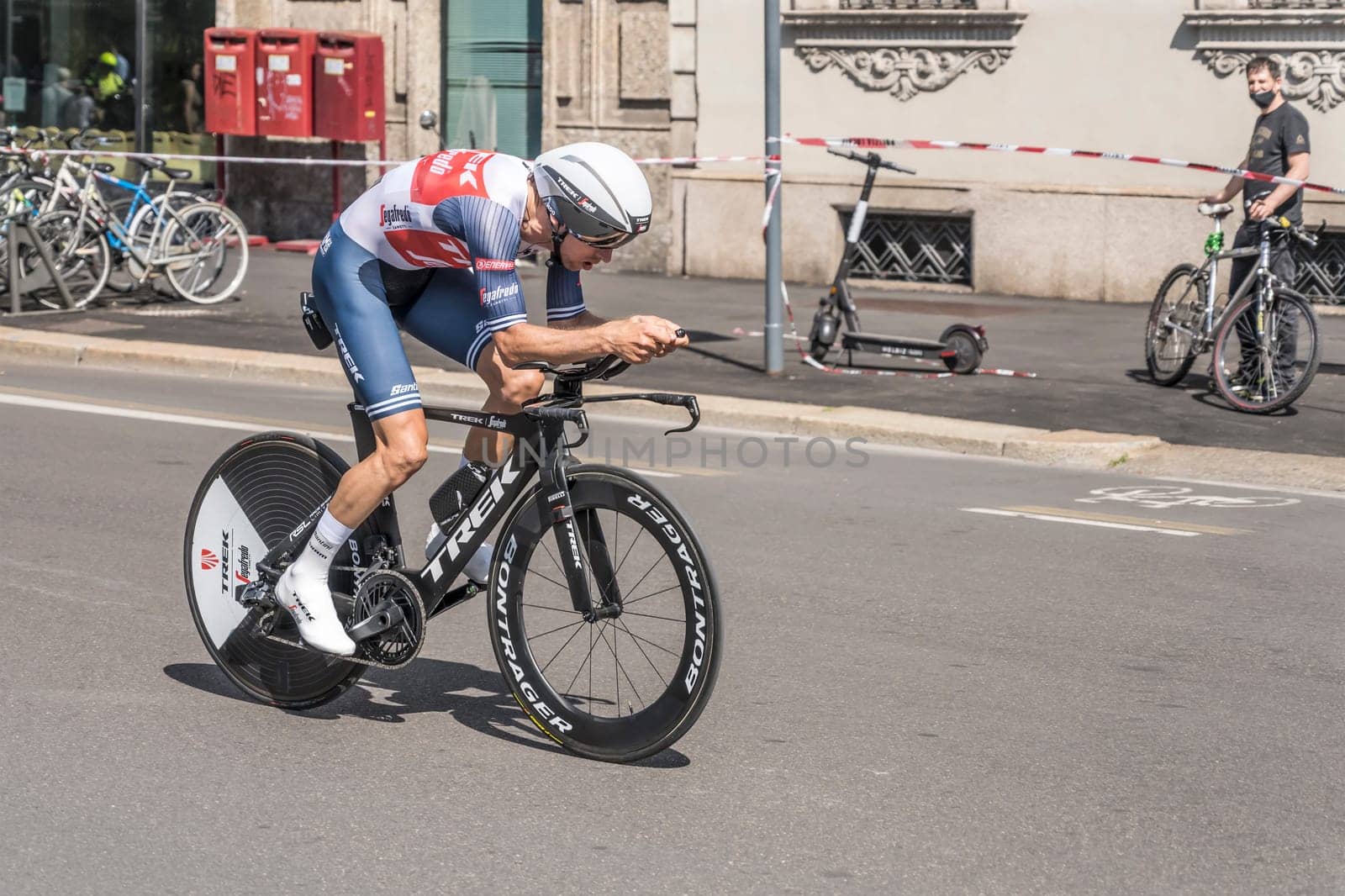 MILAN, ITALY - MAY 30: last stage of Giro 2021, Bauke Mollema competitor of TREK-Segafredo Team at high speed during individual time trial in city streets, shot on may 30, 2021 Milan, Italy.