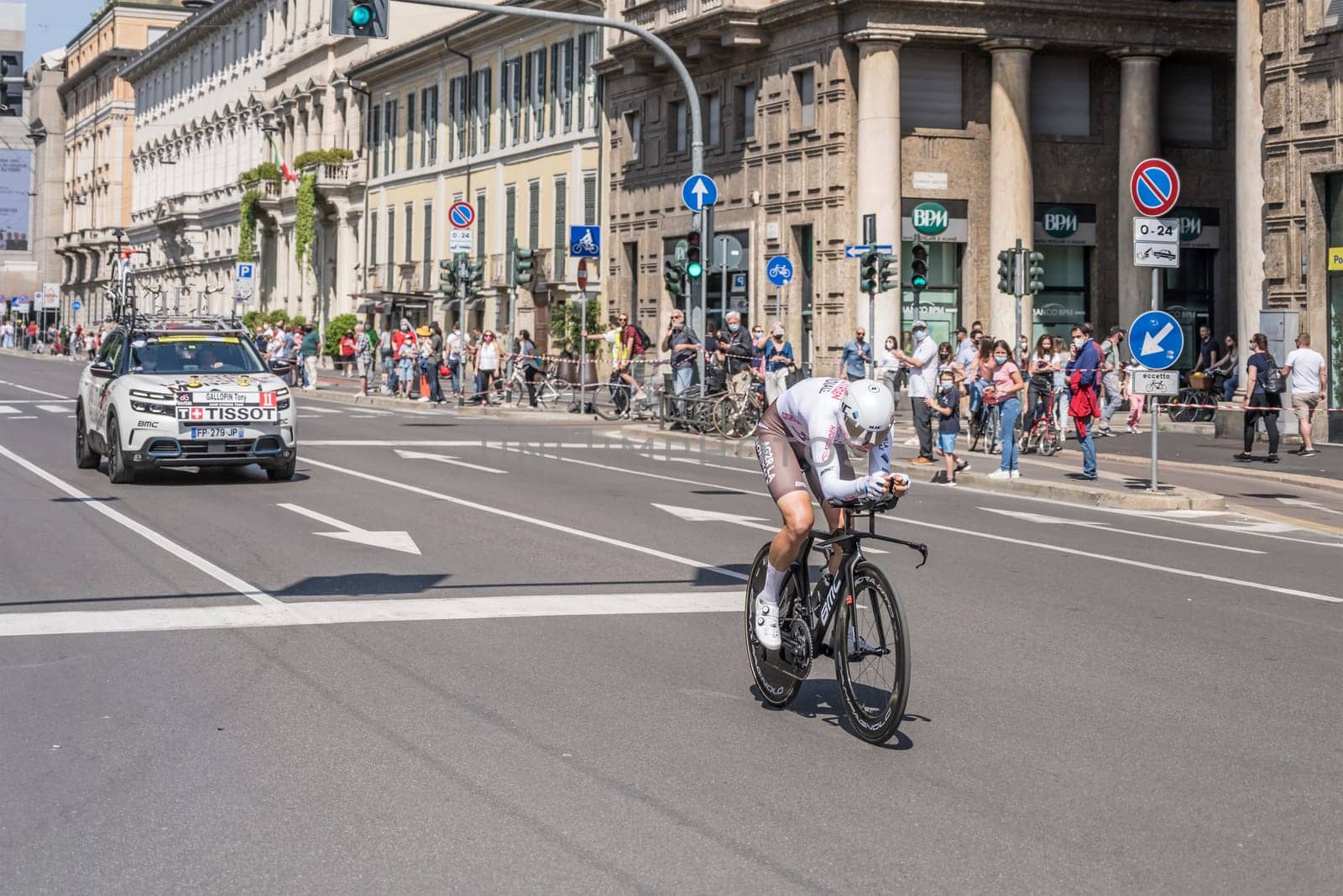 MILAN, ITALY - MAY 30: last stage of Giro 2021, Tony Gallopin competitor and AG2R Citroen Team  following car at high speed during individual time trial in city streets, shot on may 30, 2021 Milan, Italy.