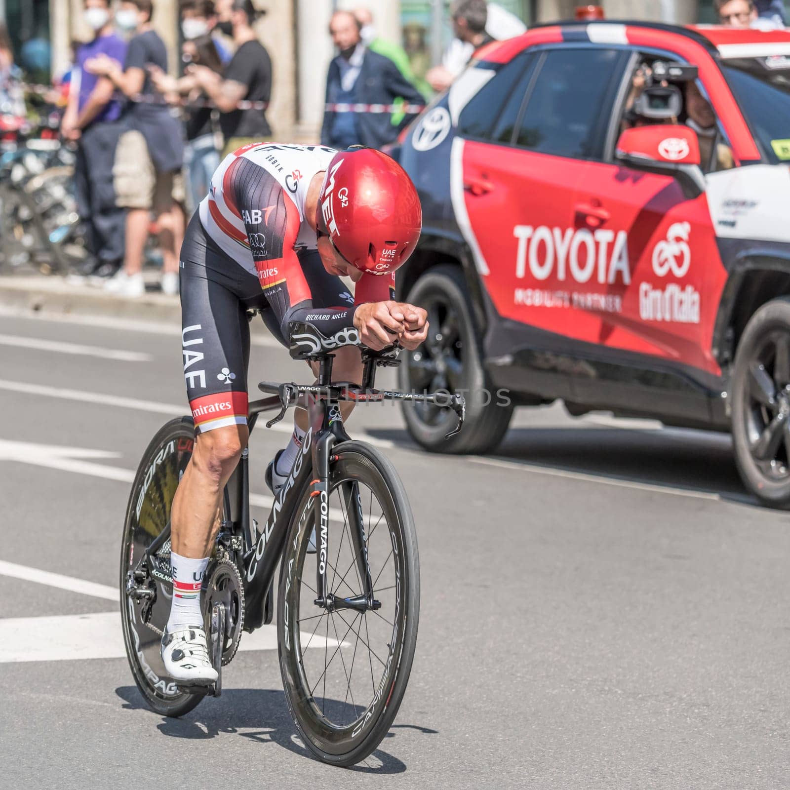 MILAN, ITALY - MAY 30: last stage of Giro 2021, Valerio Conti competitor of UAE Emirates Team at high speed during individual time trial in city streets, shot on may 30, 2021 Milan, Italy.