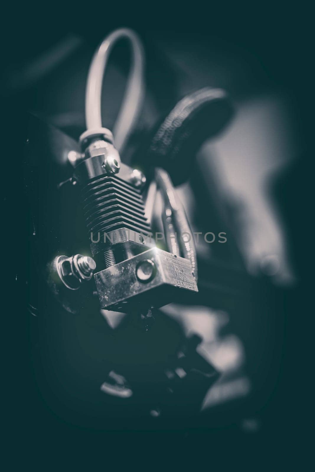 Electronic three dimensional plastic 3D printer during work in laboratory