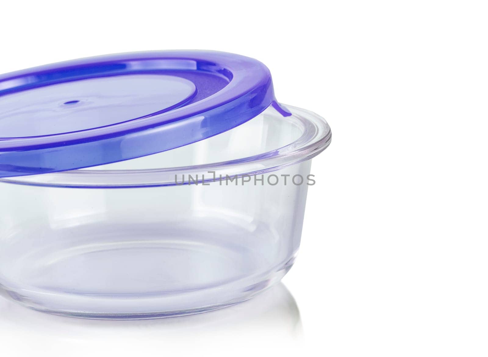 glass food container with blue plastic lid isolated on white background