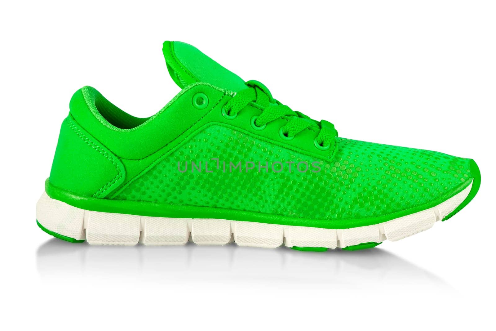 The green fashions women sneakers isolated on white