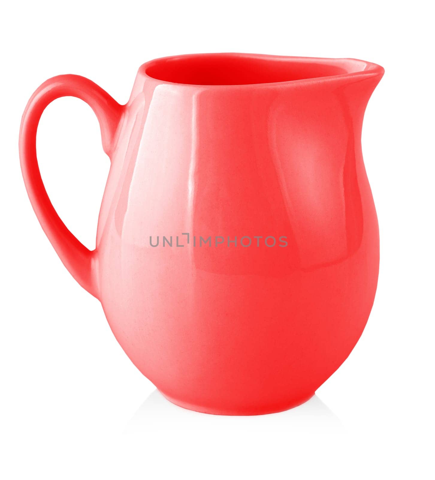 The red milk jug for milk on a white background. Copy space