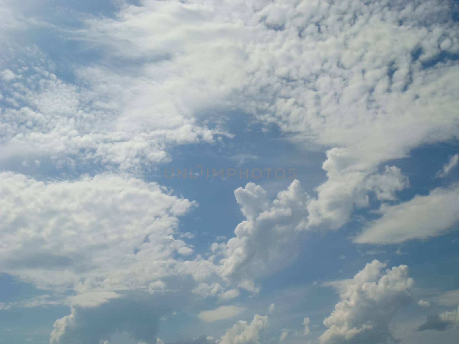 Blue sky and white clouds. The sky in the afternoon.
