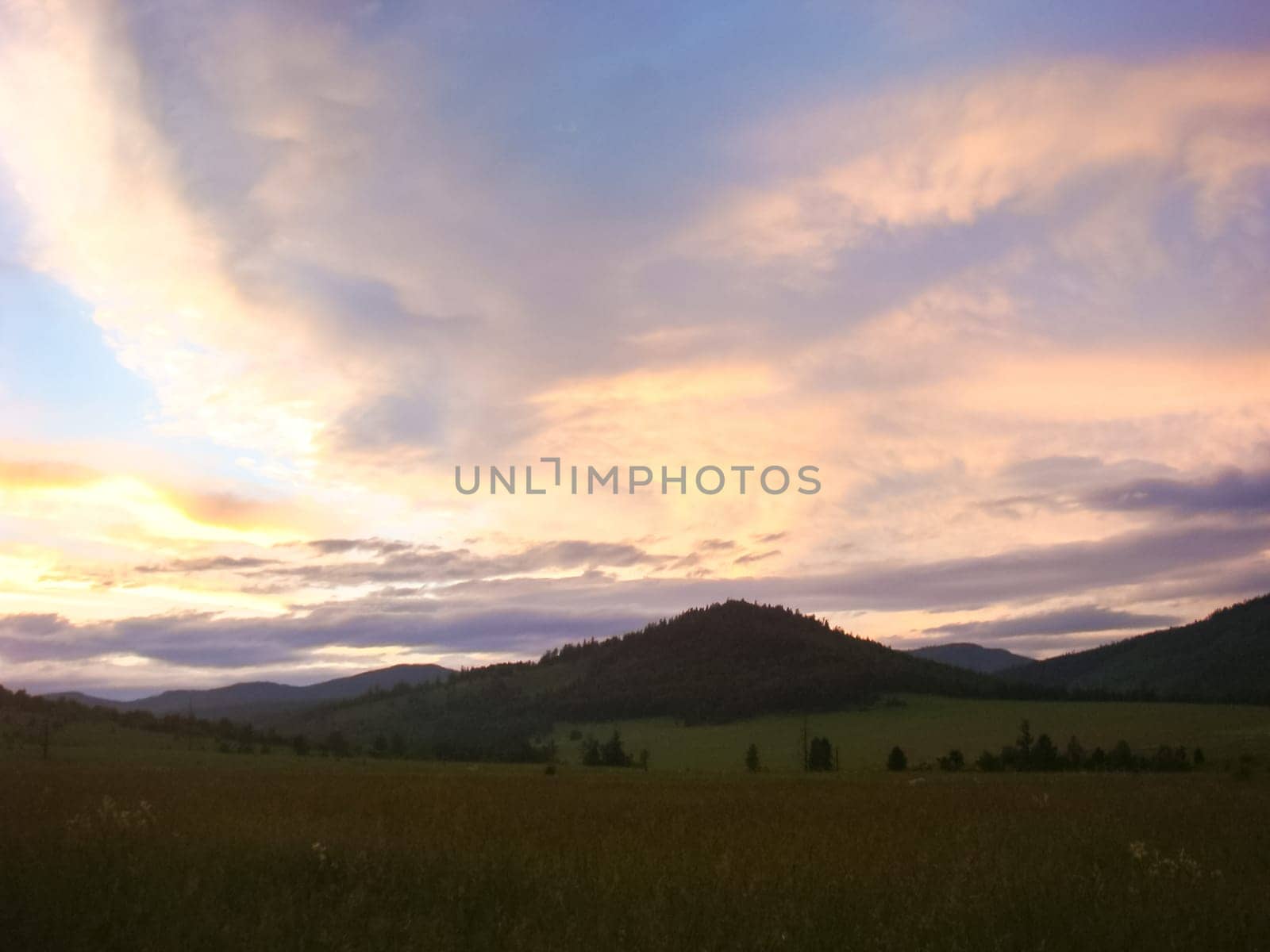 A beautiful sunset in the small bor tract. Khakassia, russia. Small Bor tract, Hakkasia. Forests and meadows Khakassia