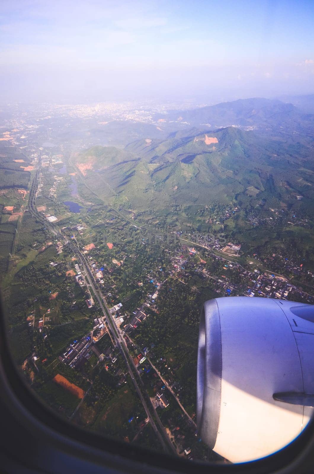 Sky view from airplane. Aerial view from windows. Transportation Concept.