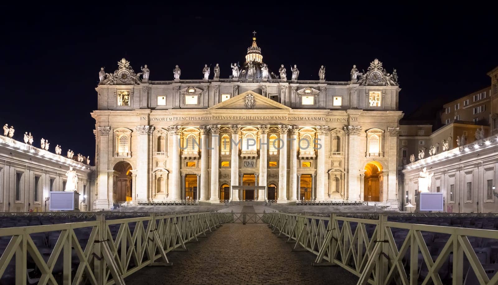 Papal Basilica of Saint Peter in  Vatican City illuminated by night, designed by Michelangelo and Bernini