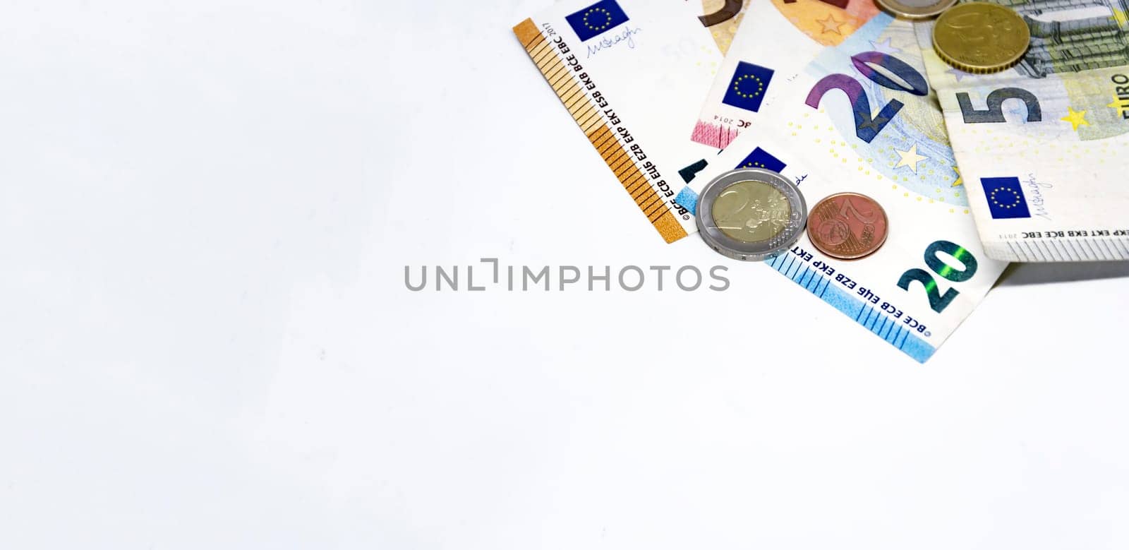 European Union coins and banknotes of different values. The euro is the European currency. Finance, economy and business. Cash and savings