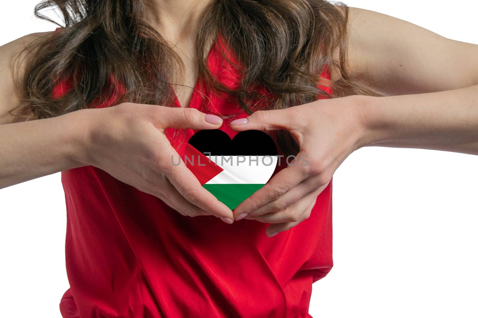 Love Palestinian state. The woman holds a heart in the form of the flag of Palestinian state on her chest. Concept of patriotism.