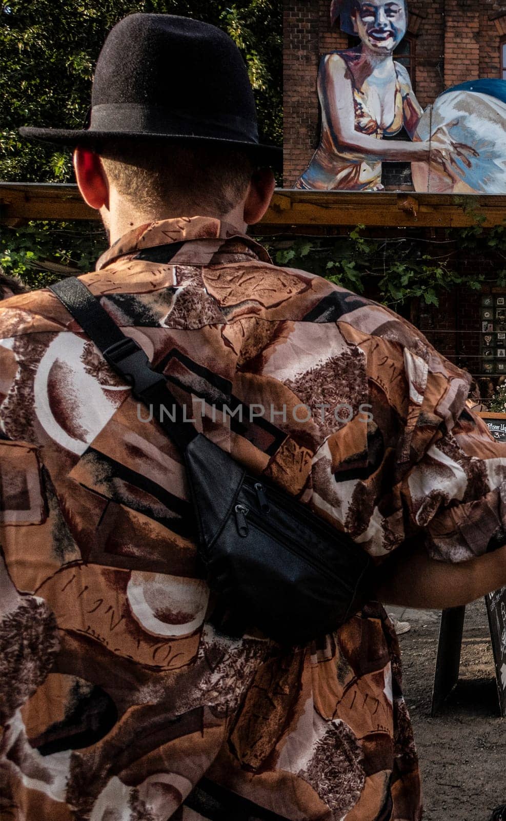 A mans back in the Berlin RAW