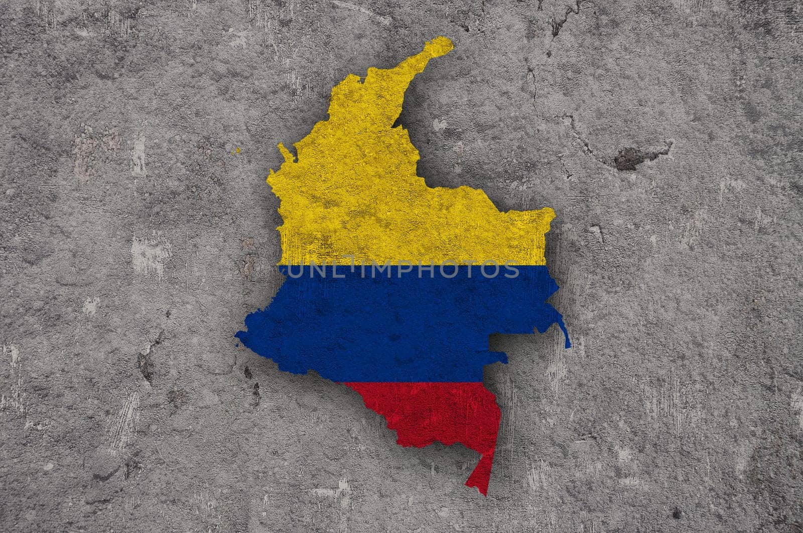 Map and flag of Colombia on weathered concrete