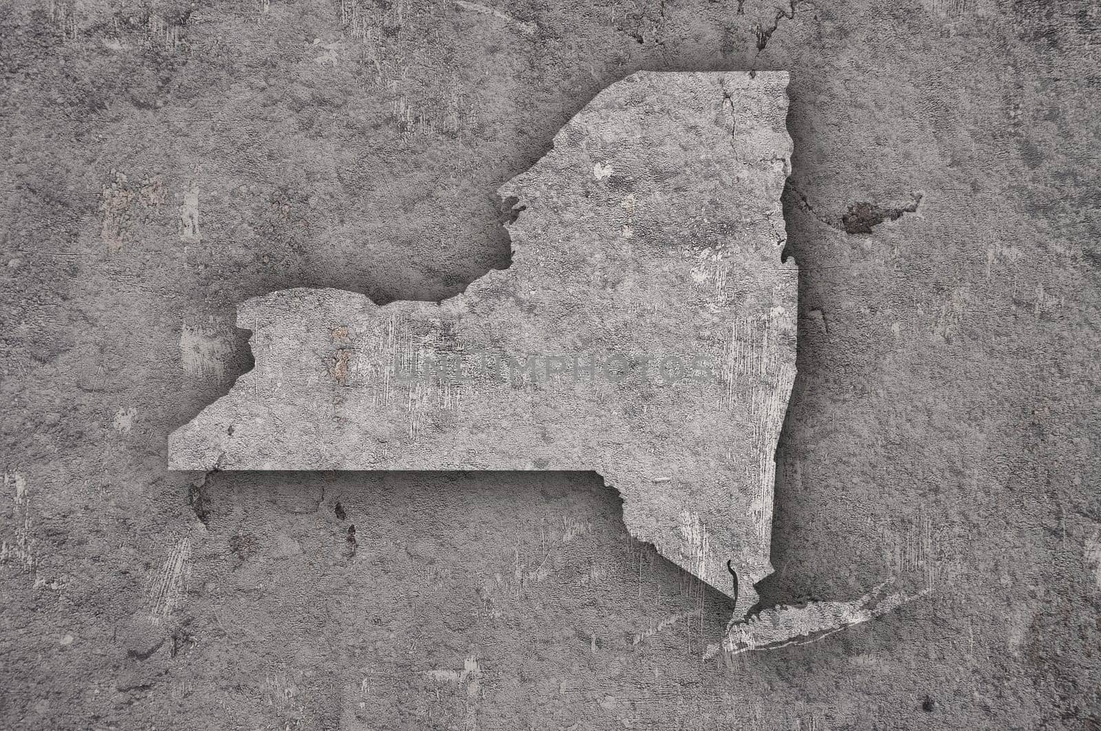 Map of New York on weathered concrete